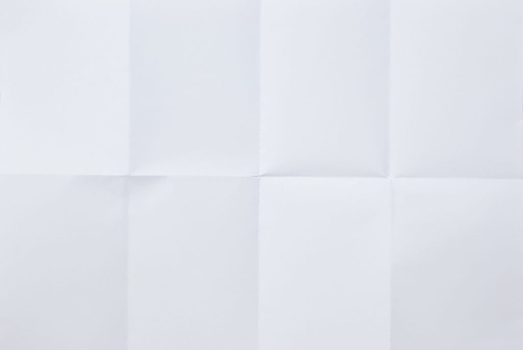 One piece of white paper folder into 8 squares