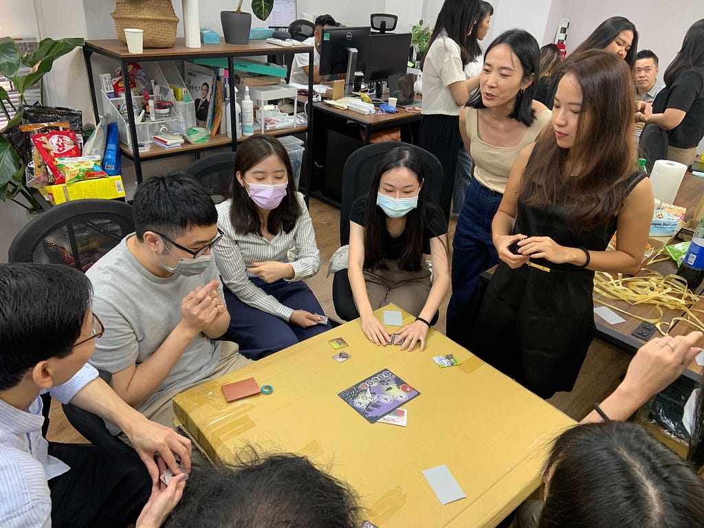 CakeResume team playing Avalon board game