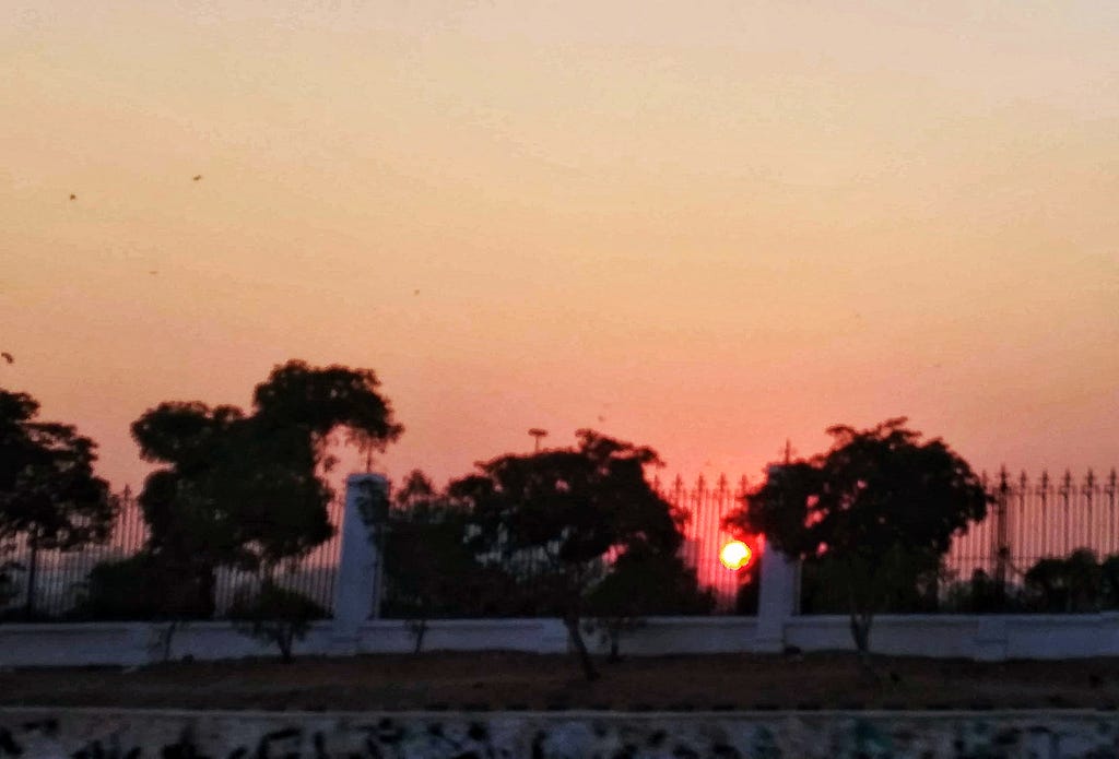 The sun about to set in Karachi, captured outside the garden of the Mazar-e-Quaid.