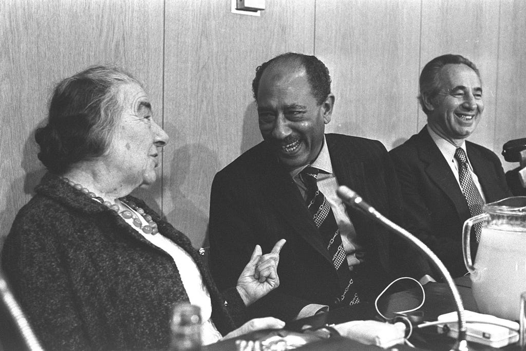 Anwar Sadat with Golda Meir and Shimon Peres in the Knesset. (Ya’acov Sa’ar/GPO) via The Times of Israel