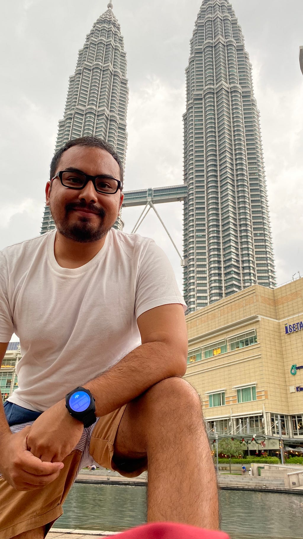 Picture of author with backdrop of Petronas Towers