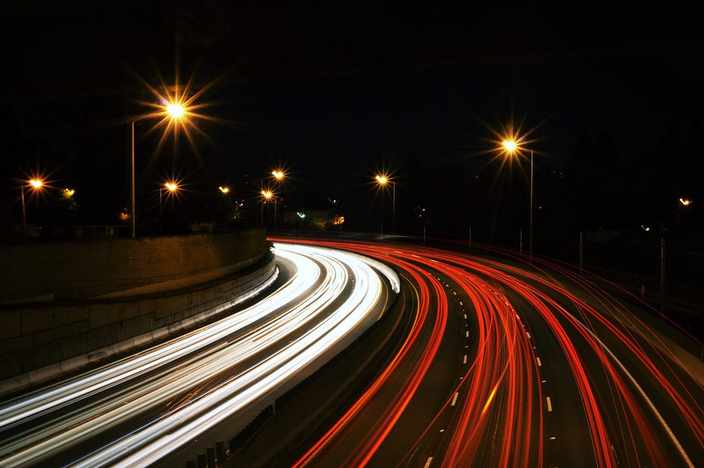 A busy highway at night