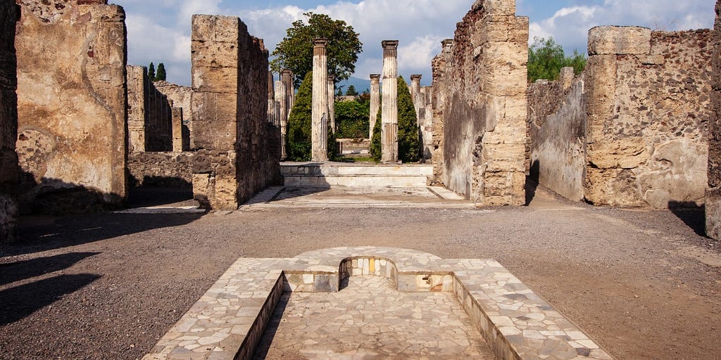 Courtyard of a ruined villa at the ancient Roman city of Pompeii that was kept preserved by Vulcanic ash when Mt. Vesuvius erupted in 79AD.