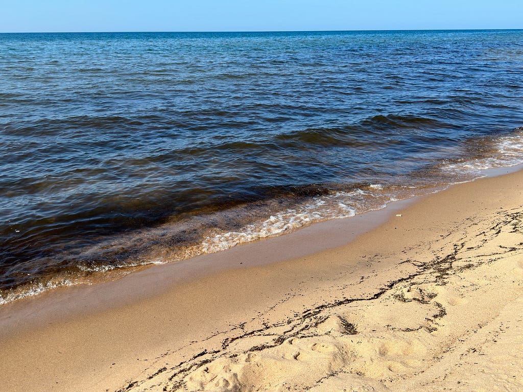 soft wave splashing against the beach of Lake Superior