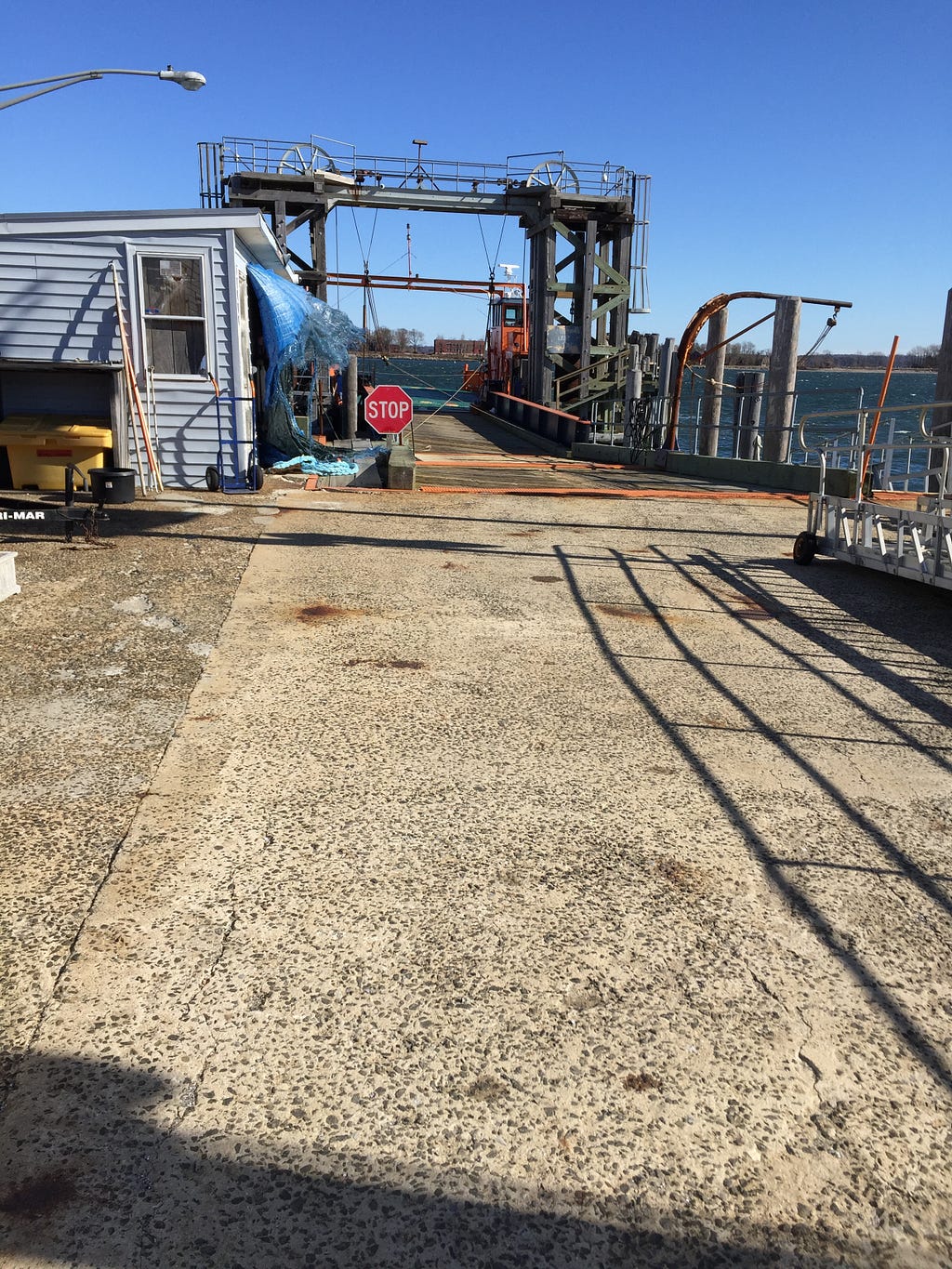 The dock and ferry that transports individuals to Hart Island. It seems to be in shambles but is effective. Photography by the Author.