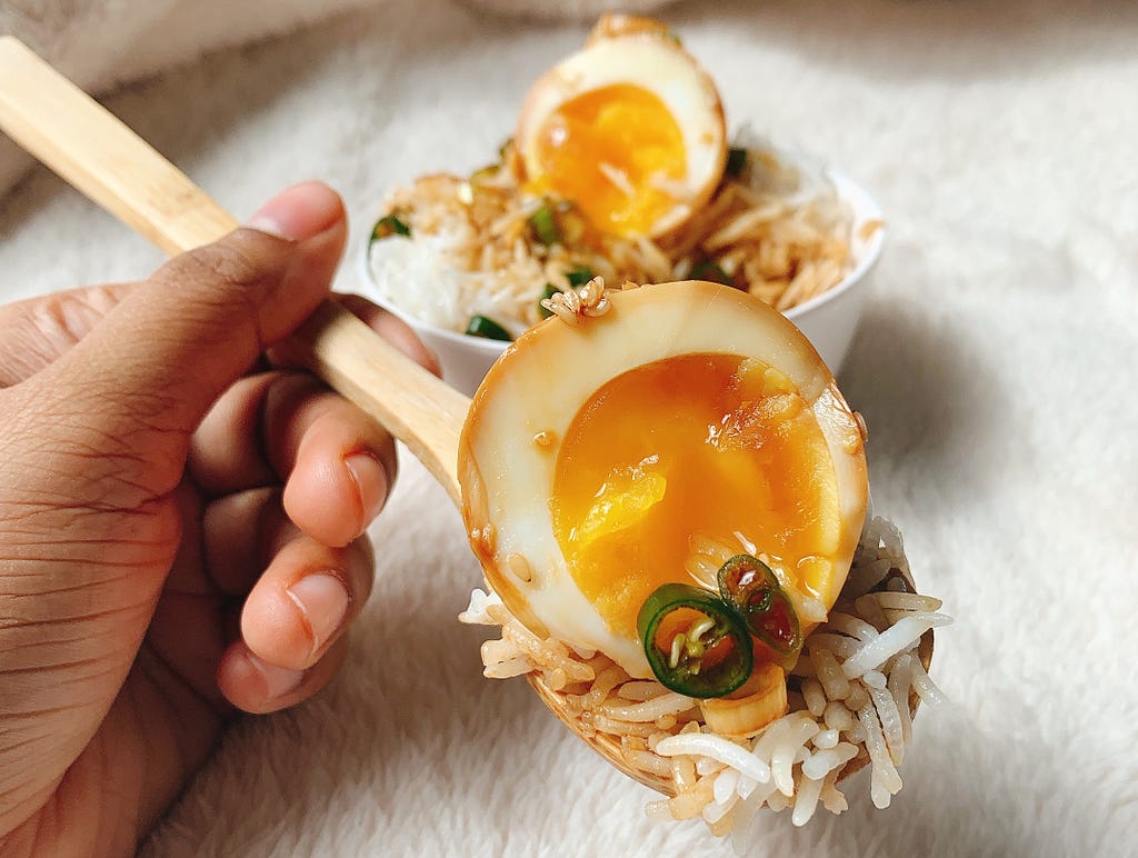 A delicious Spoonful of TheGoodFoodPage’s Korean Mayak Eggs, with chillies & sesame seeds
