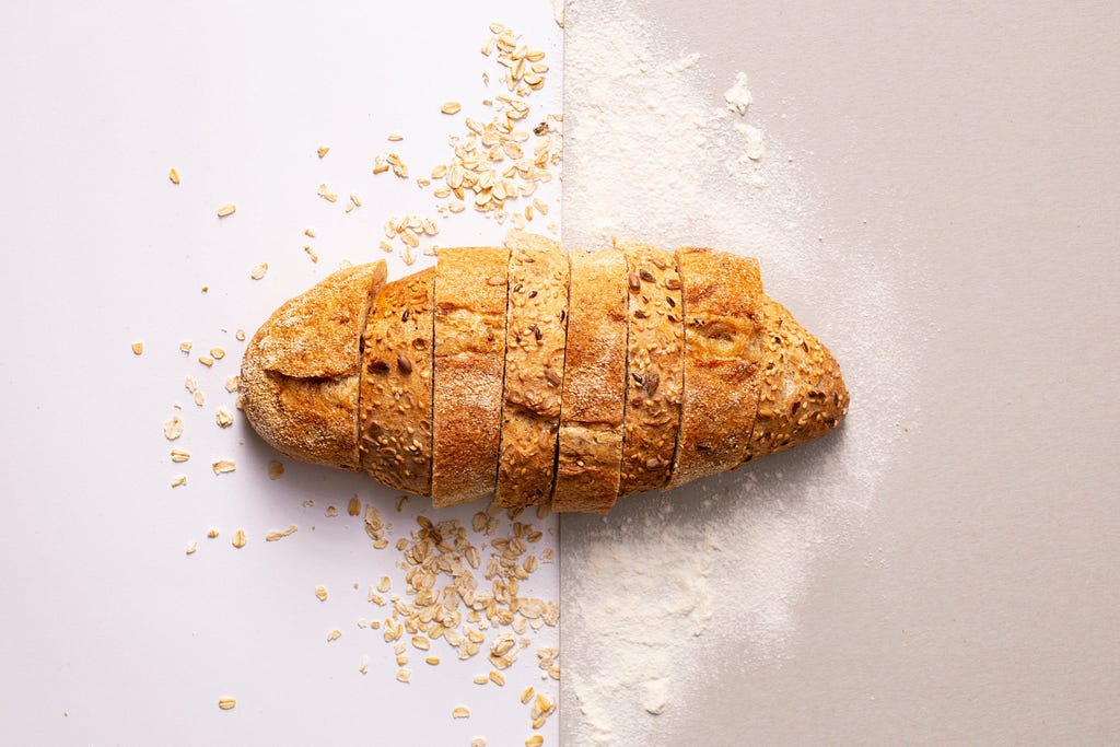 Crusty bread sliced vertically viewed from above