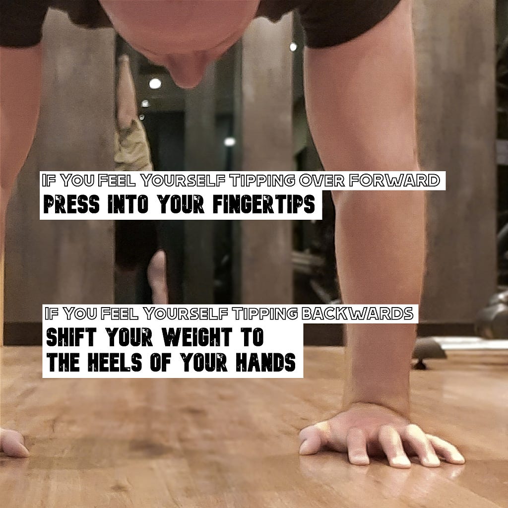 Instructional photo showing how to shift your weight between the fingertips and the back of the hands to hold a handstand.