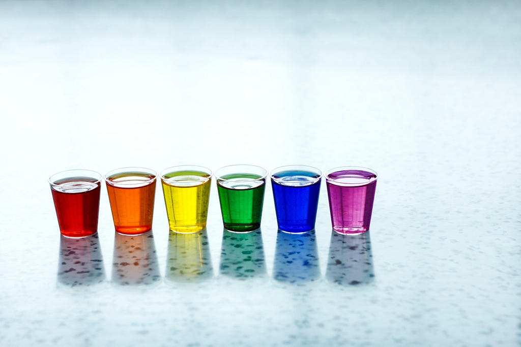 6 shots of various colors aligned to represent the dopamine shots you receive with each notification