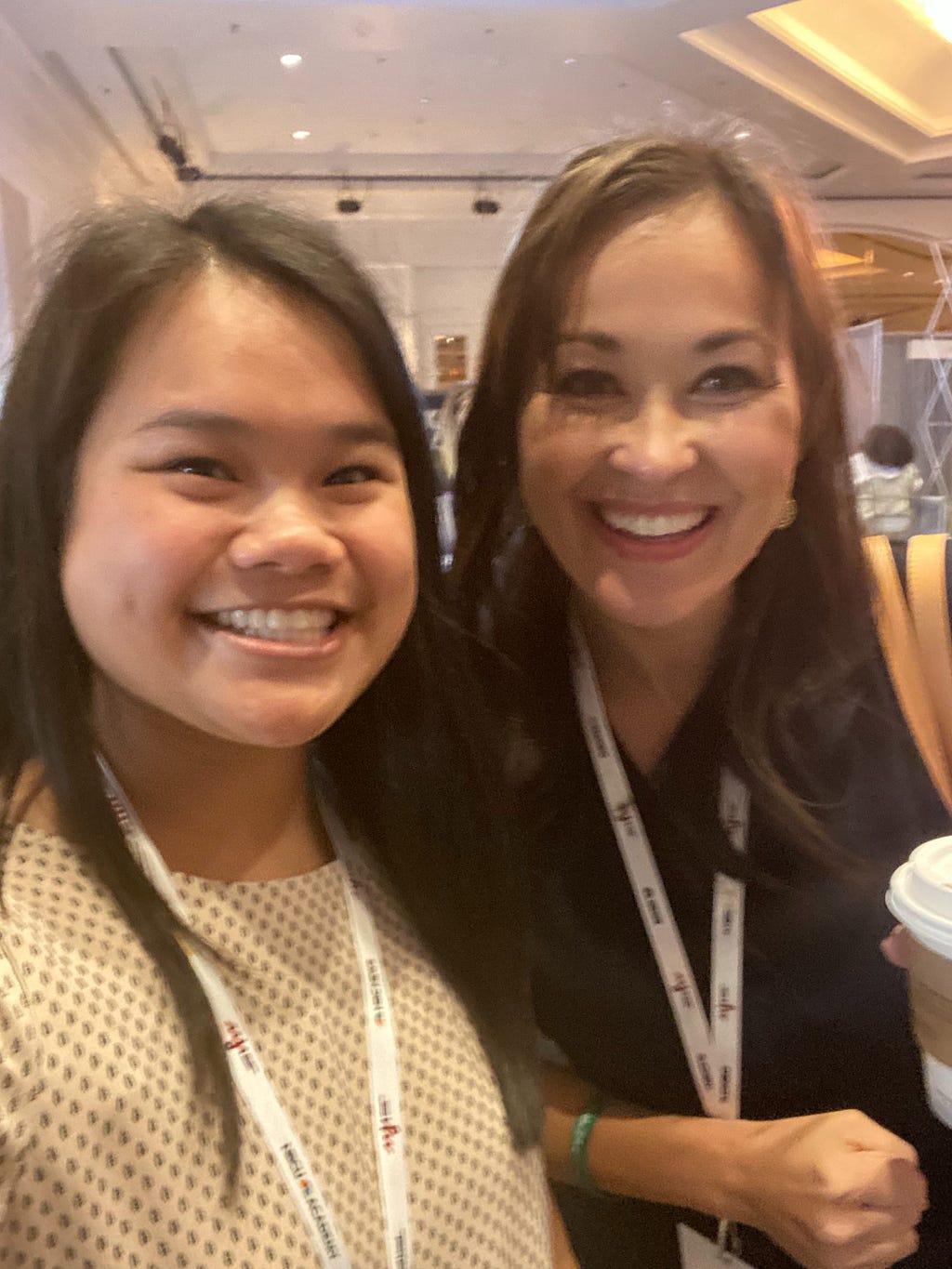 two women smiling for a selfie