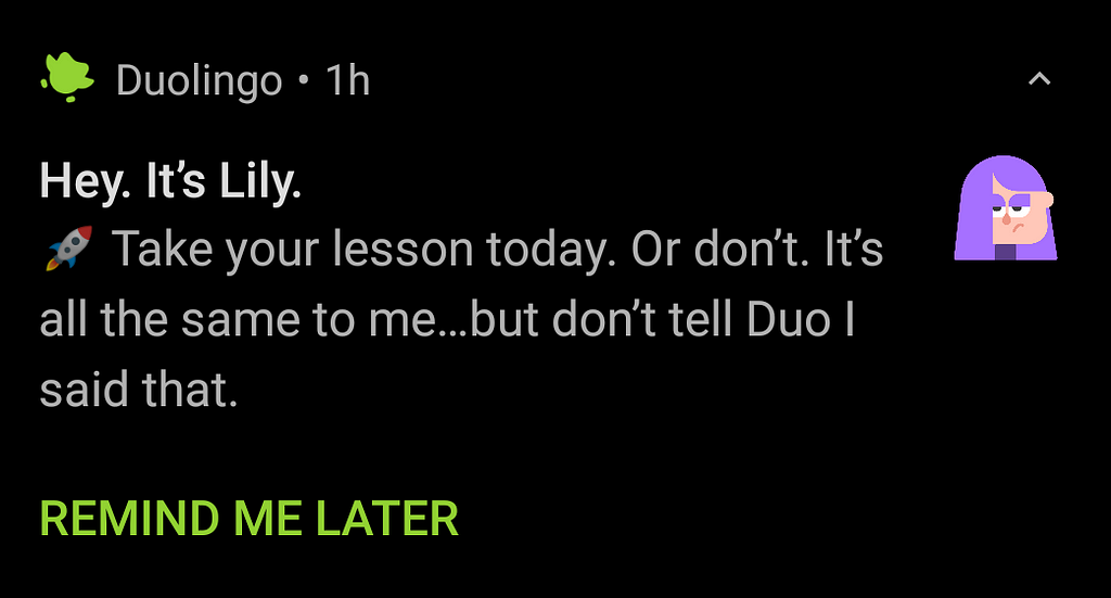 Screenshot of a phone notification from the app with a teenage, moody cartoon character: “Hey. It’s Lily. Take your lesson today. Or don’t. It’s all the same to me… but don’t tell Duo I said that.”