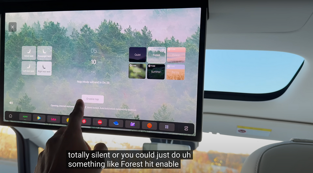A car infotainment screen displaying options for nap mode settings, including soundscapes like “Forest” and seat-specific adjustments.
