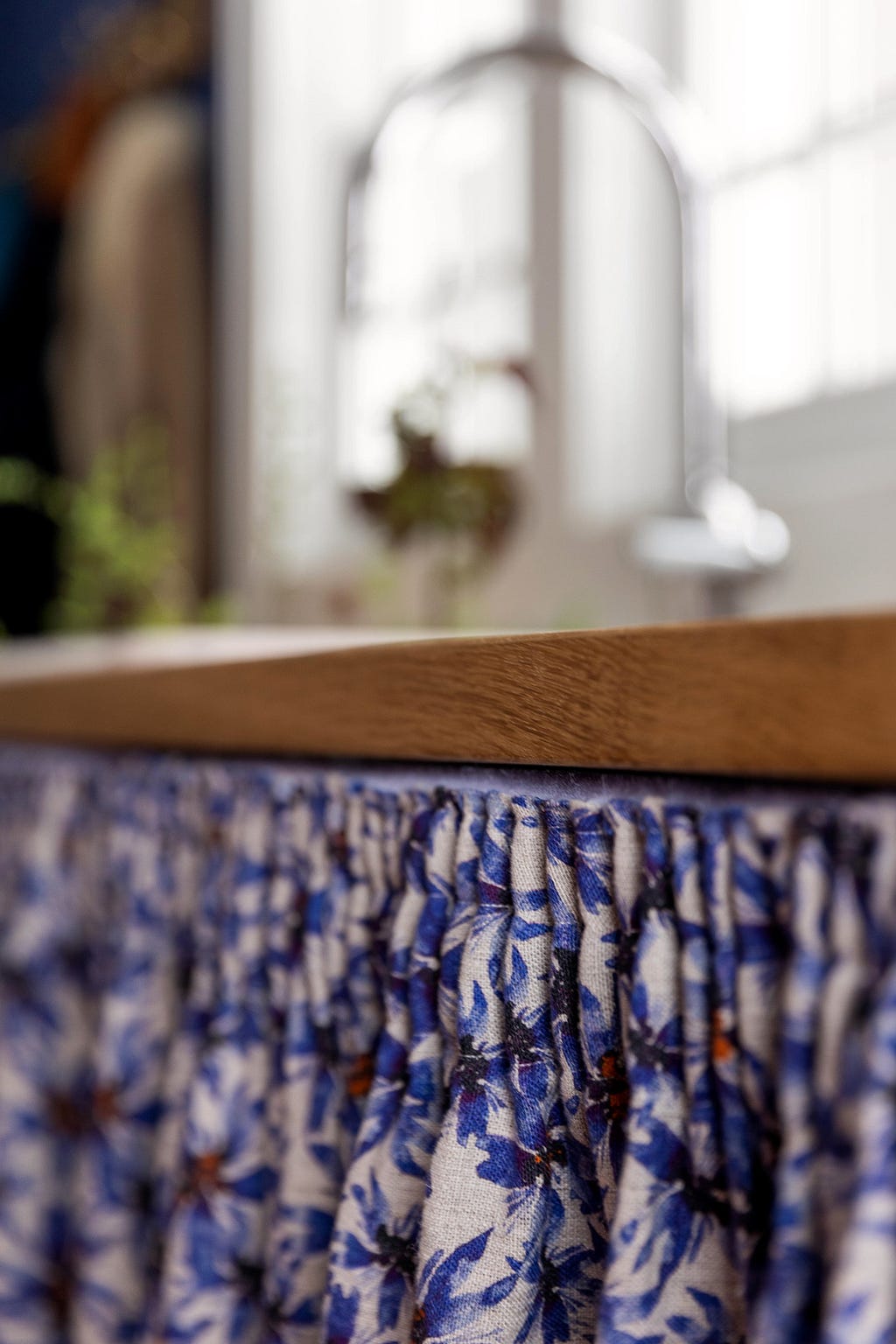Detail of a sink curtain attached with velcro.