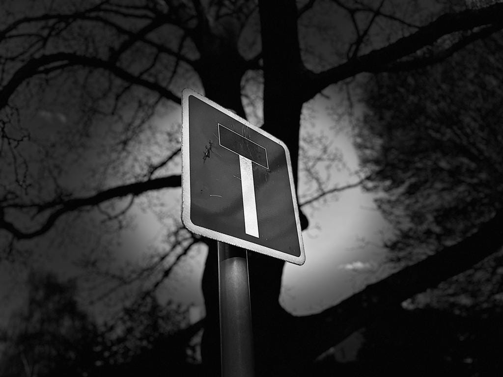 A photo of a dead-end sign on a British street