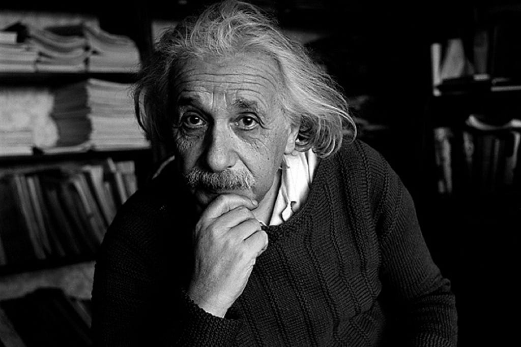 A black and white photo of Albert Einstein.
