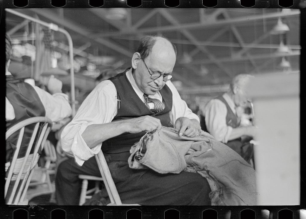 Barry Leving, a tailor working in the cooperative garment factory at the Jersey Homesteads, a United States Resettlement Administration subsistence homestead project. Hightstown, New Jersey. Credit: Russell Lee, Nov 1936, Library of Congress Prints and Photographs Division.