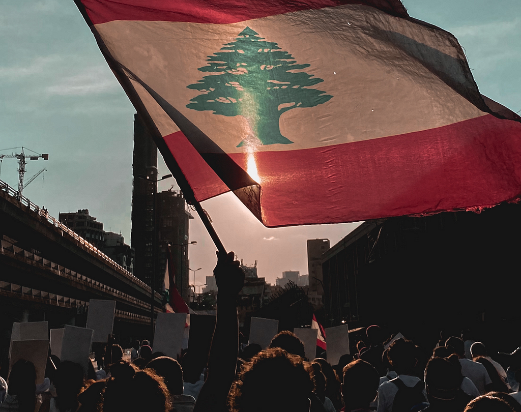 Lebanese flag captured during the protests following the blast.