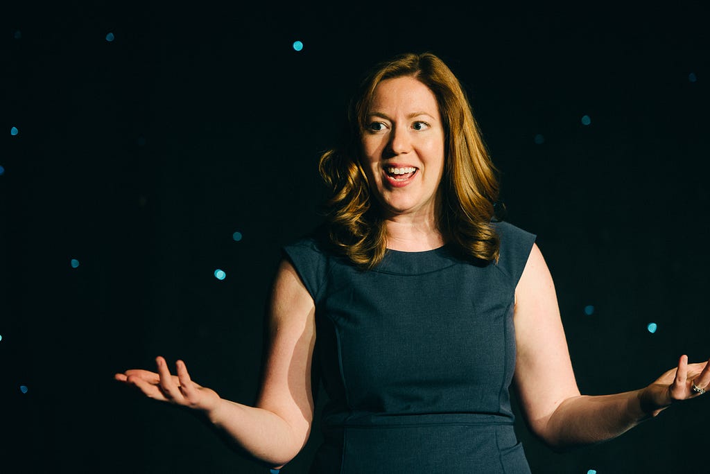 Photo of Margot Bloomstein gesturing while speaking. ©Erik Westra.