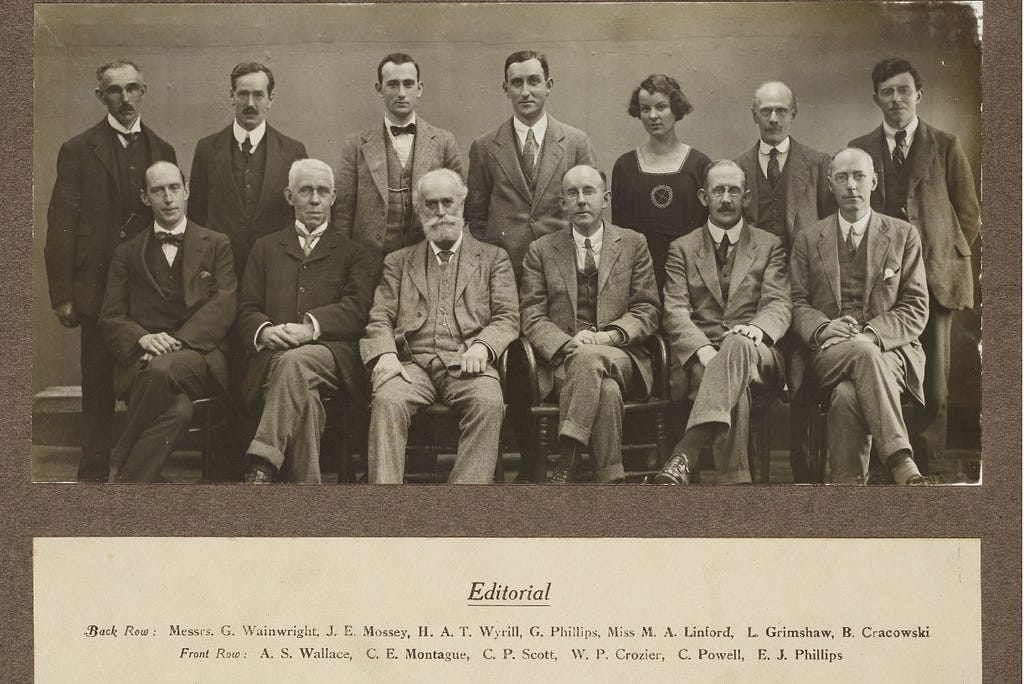 photograph of male employees at the Guardian. Madeline, the only woman, is on the back row