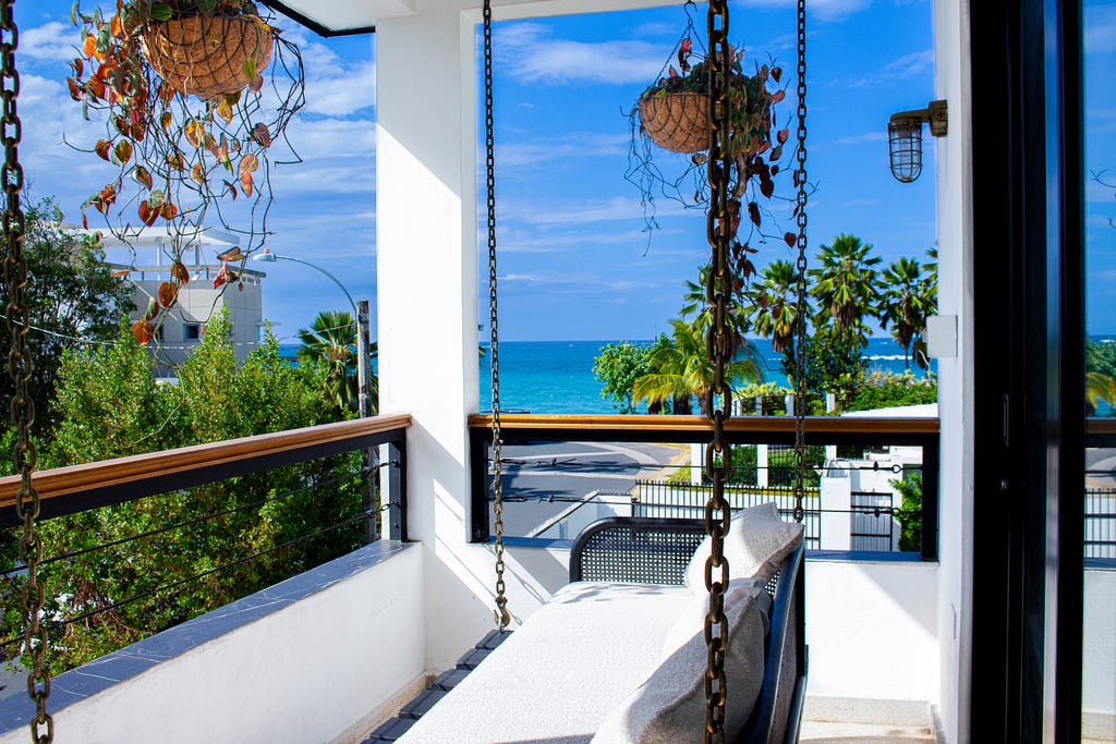 Ocean View from the balcony in Villa Azure. Balcony features sofa swing for your enjoyment.