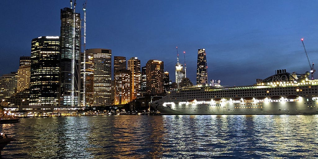 Cryise ship at night docked in Sydney Harbour