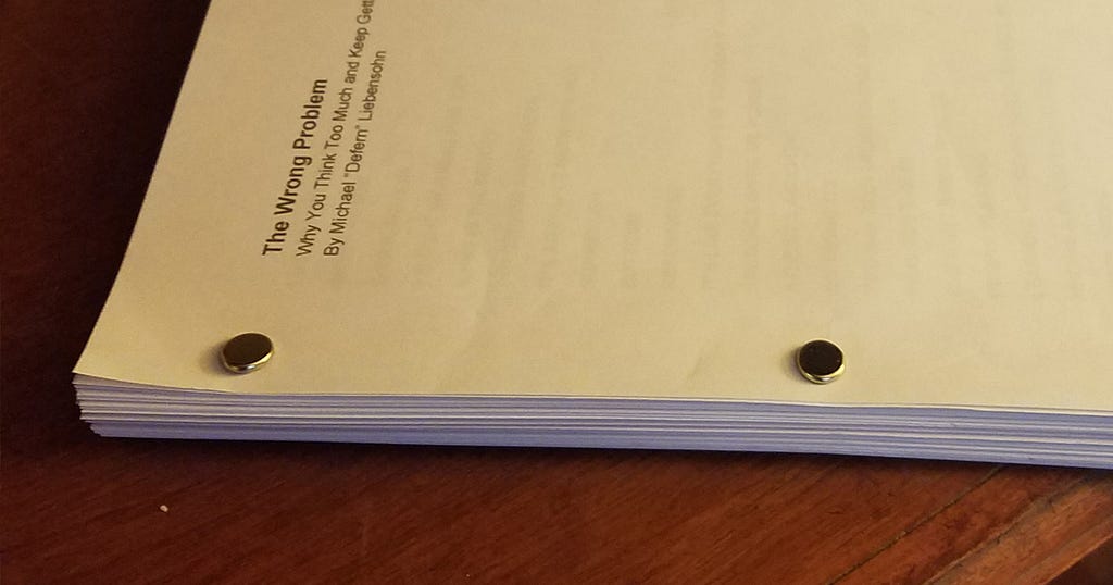 Picture of The Wrong Problem book manuscript on a table