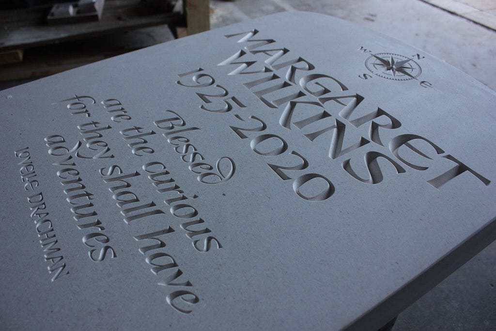 Example of V-carved letters in Nabresina Headstone by Artisan Memorials.