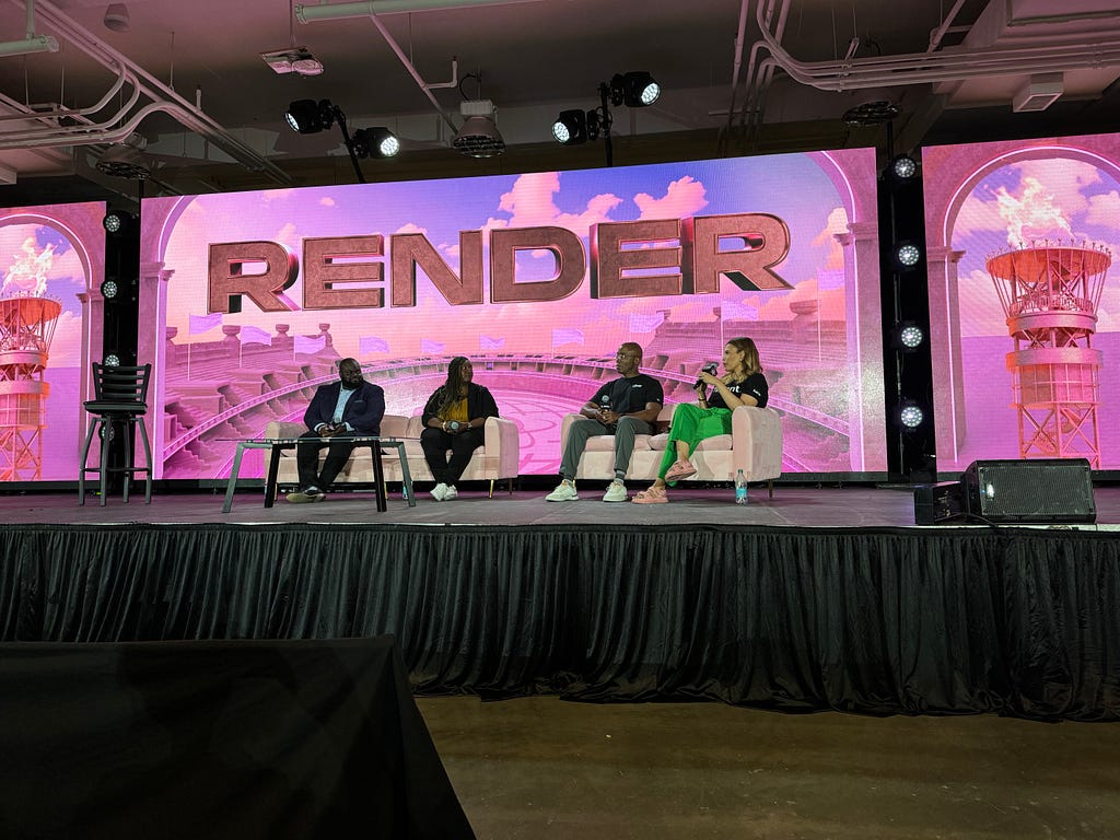 Crystal Moore, Tanisha Barnett, and Justin Simpson speak on a group panel discussion on the main stage.