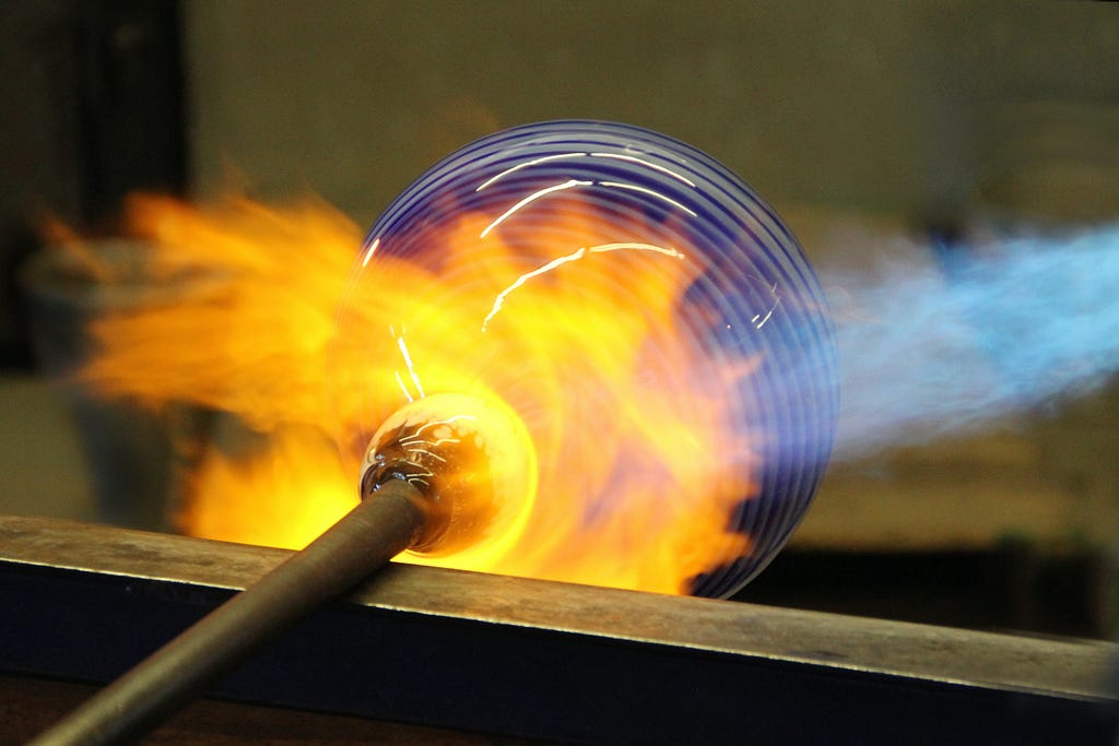 Photo of glassblowing.
