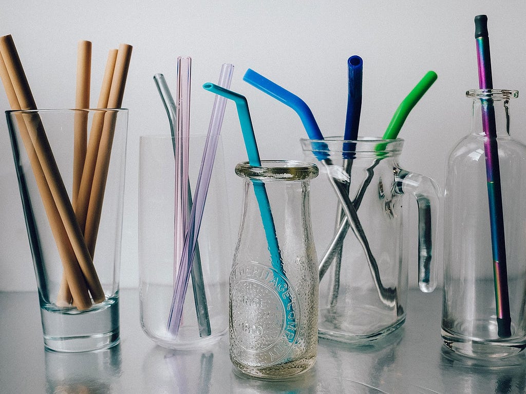 Different types of straws — Bamboo, glass and stainless steel