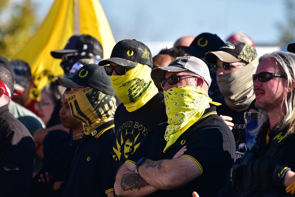 Masked Proud Boys at a protest in Raleigh, North Carolina — Anthony Crider, CC BY 2.0, via Wikimedia Commons