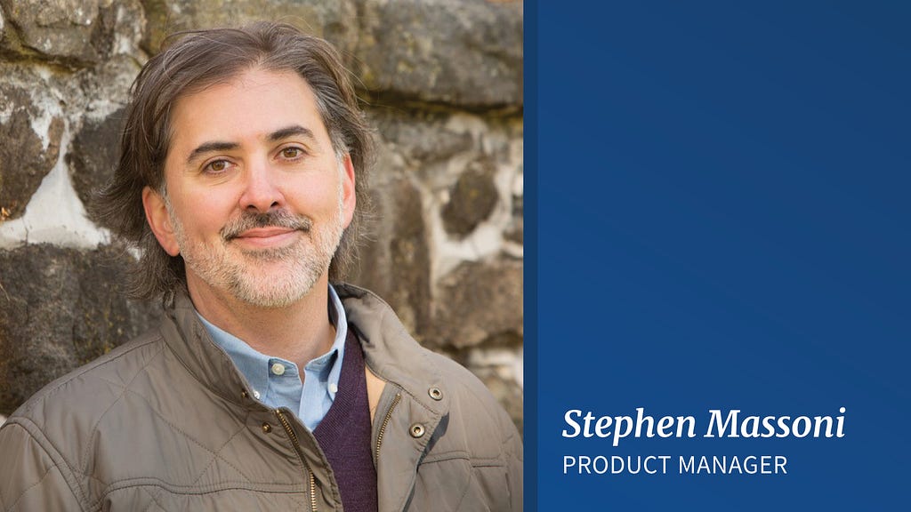 A photo of Stephen Massoni, a man with white skin, brown hair and a salt-and-pepper beard wearing a jacket with a collared shirt and a sweater underneath. On the right, white letters on a blue background read “Stephen Massoni, Product Manager.”