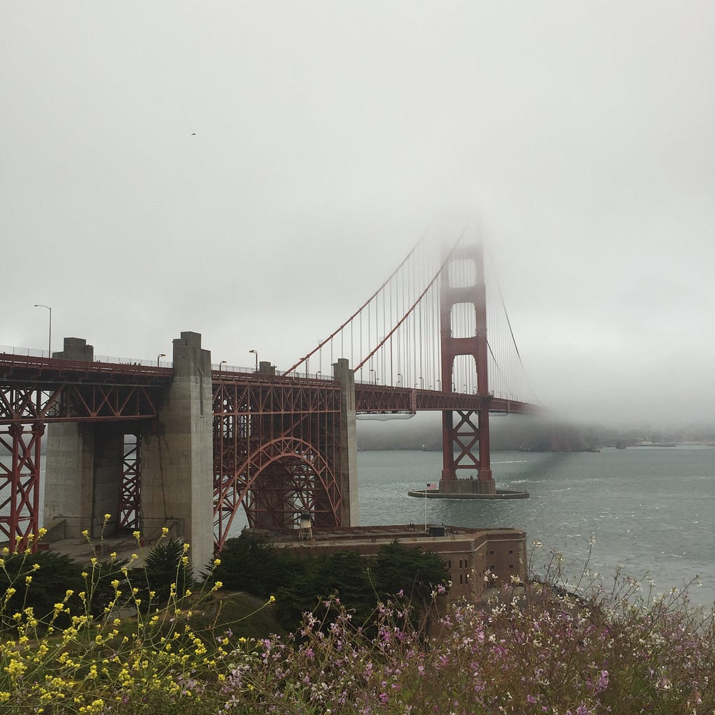 Bridge disappearing away into the mist