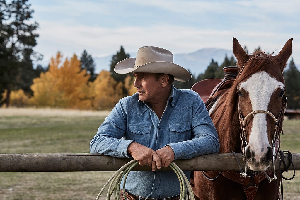 A picture of Kevin Costner with a horse on the set of “Yellowstone.”