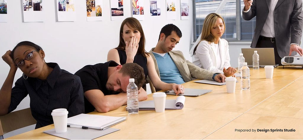 Business people in a meeting are bored to death