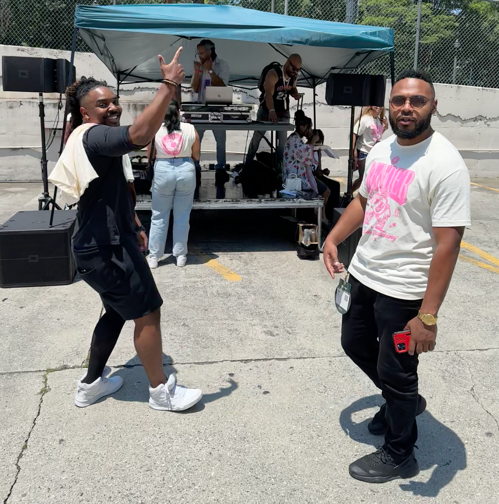 Conference attendees danced outdoors to a DJ while waiting in line for food trucks.