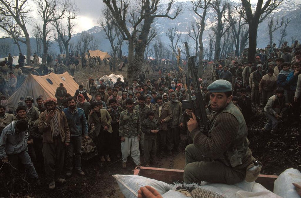 Turkish soldier impeding the flow of Iraqi Kurdish refugees to Turkish territories in 1992