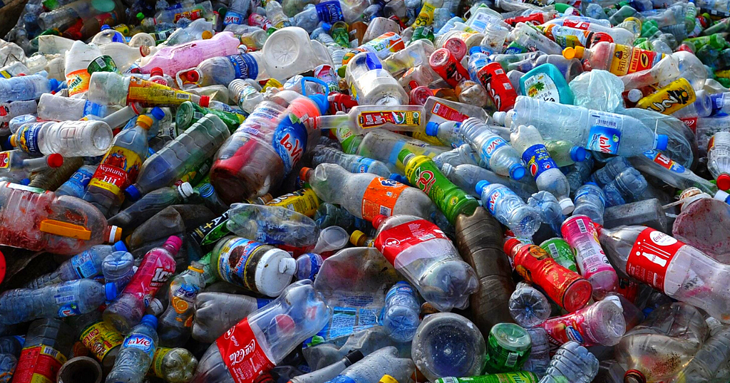 A pile of hundreds of used plastic bottles