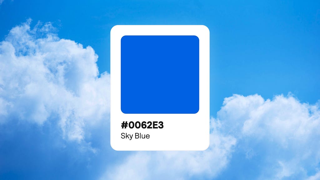 Sky blue colour chip against a cloudy blue sky