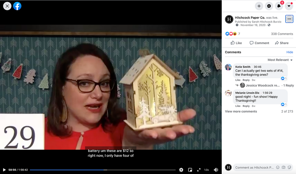 Screenshot of Facebook Live video including a women in red shirt holding up a house ornament. Comment section is to the right