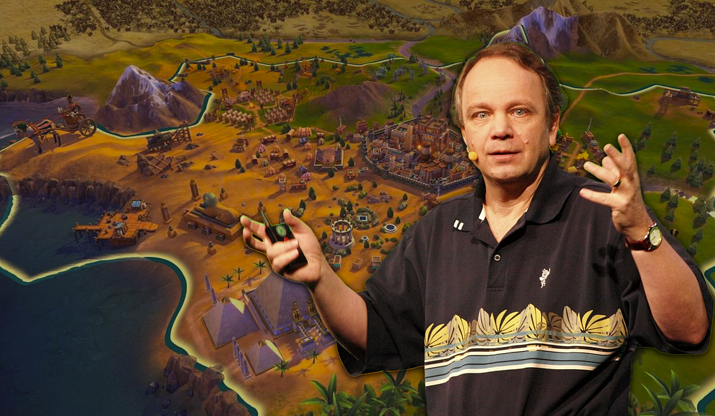 Sid Meier presenting a keynote with an edited background of his game, Civilization.