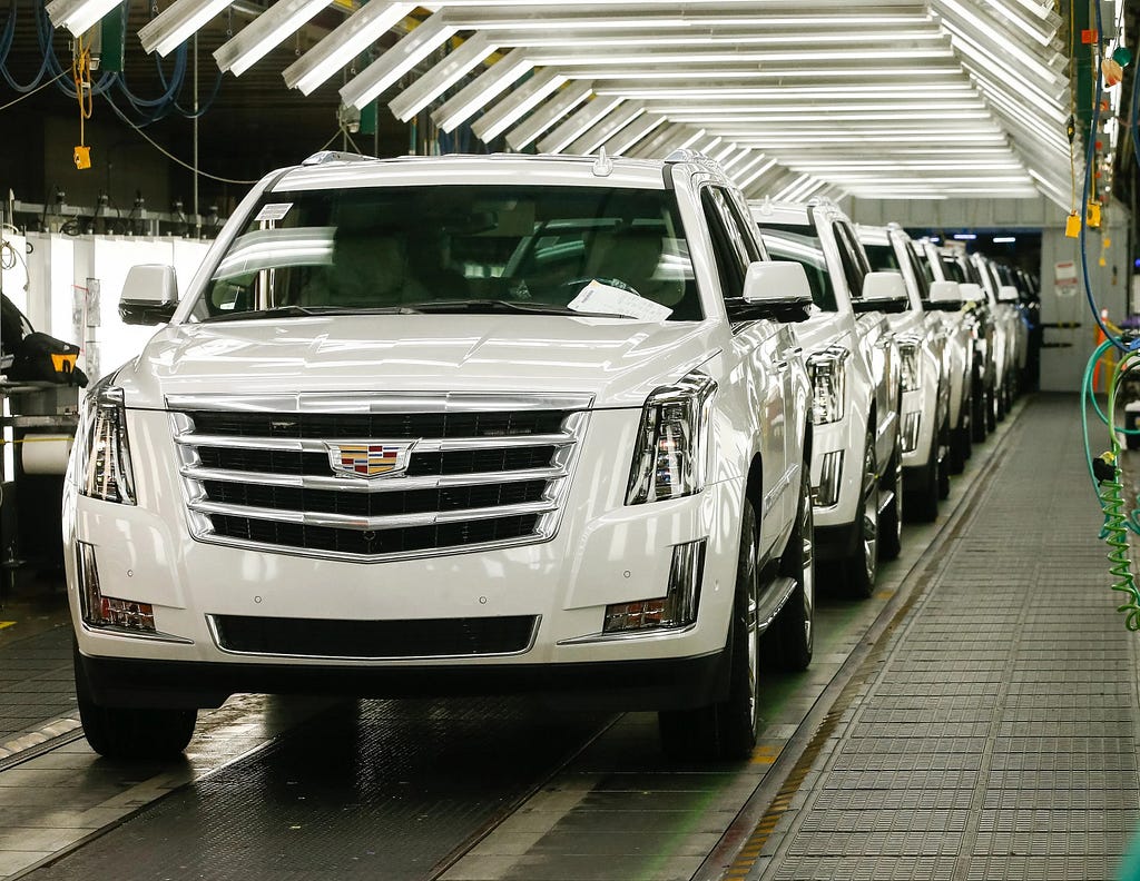 A shot of a Cadillac SUV assembly line