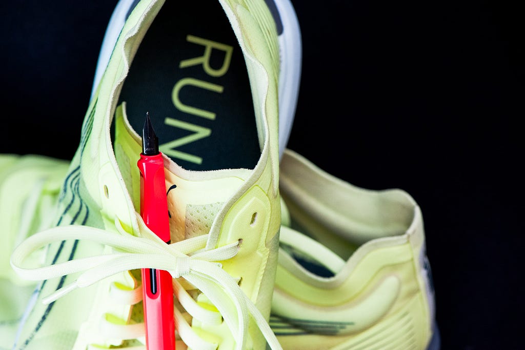 Because the GoPro activity images didn’t turn out well enough, I picked an outtake from a still life session for an upcoming post that combines running and writing. Picture shows a pair of running shoes and a fountain pen.