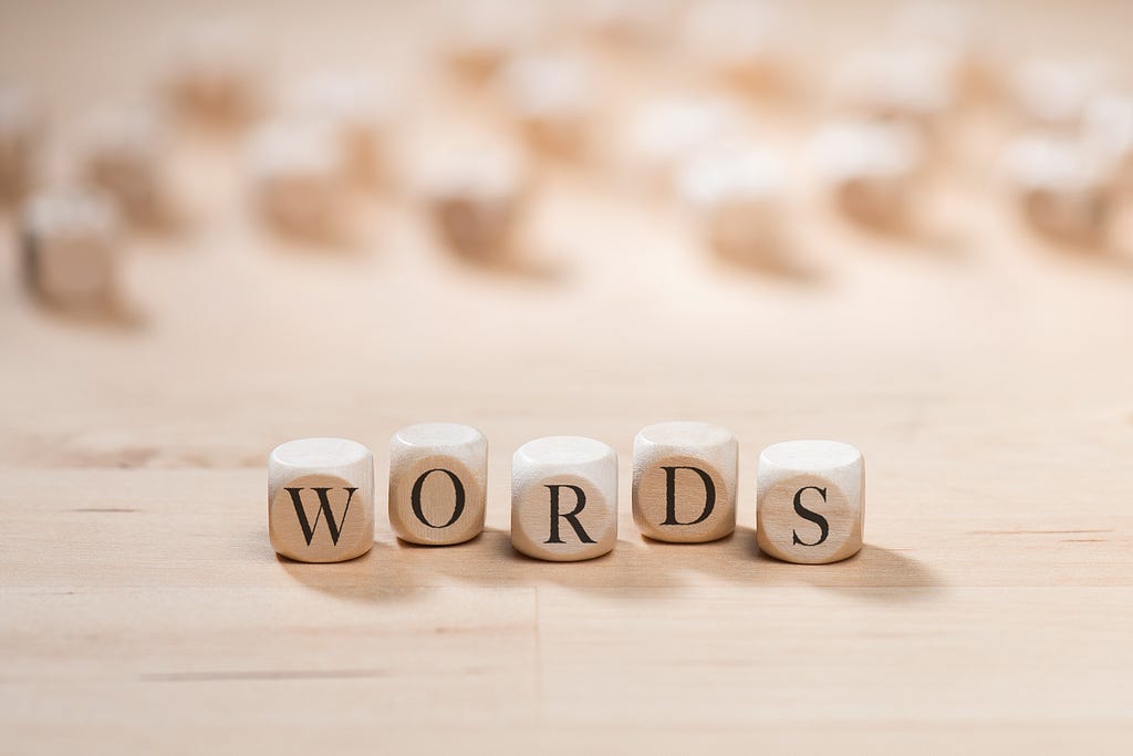 The word “words” on wooden cubes