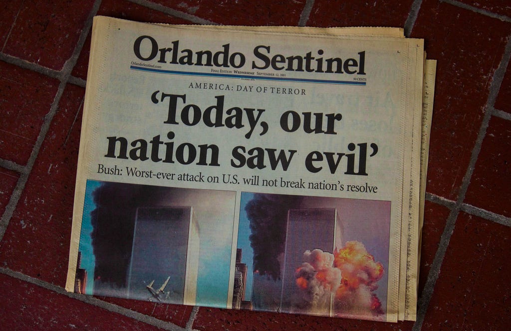 Photo of a Newspaper, the Orlando Sentinel with the headline ‘Today, our nation saw evil’ on 9/11