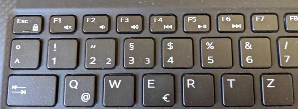 Part of a keyboard with play buttons for media players