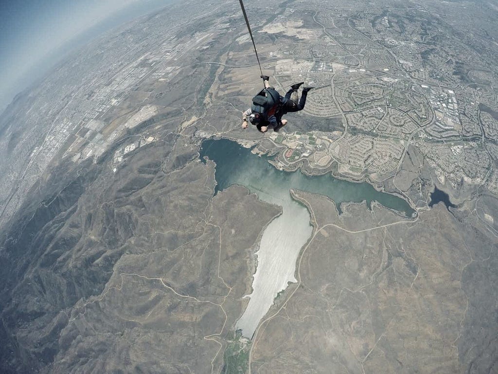 A parachutist floating in air