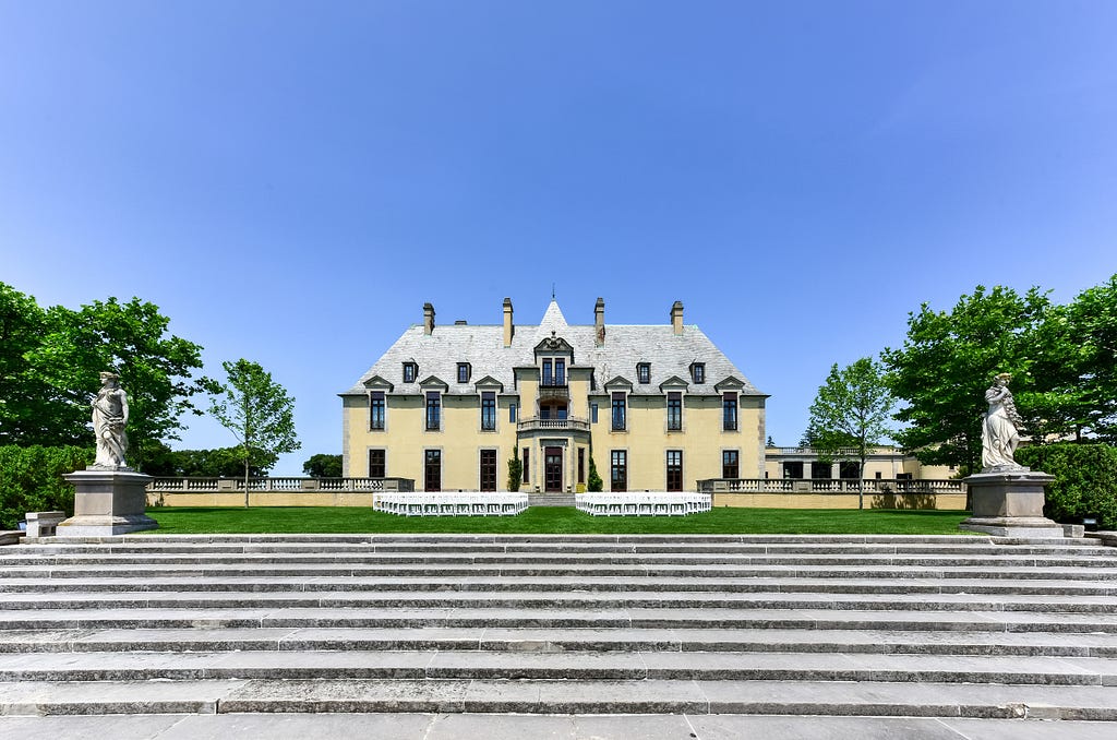 Grounds and staircase leading to view of Oheka Castle