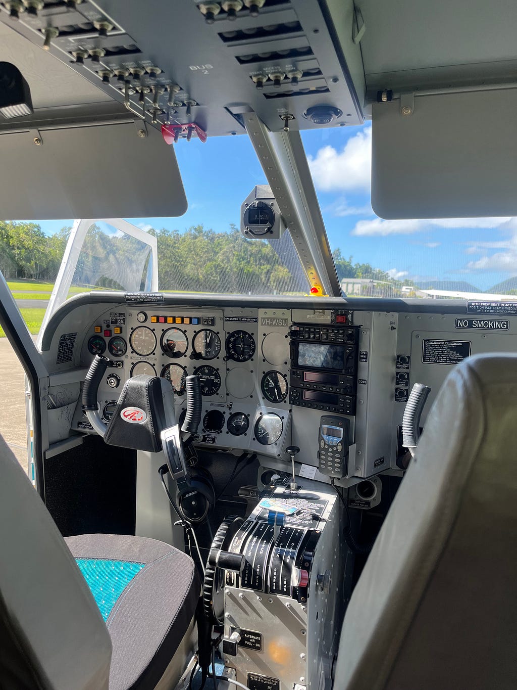 Interior view of a small aircraft used for scenic flights over the Heart Reef, providing passengers with breathtaking aerial views of the Great Barrier Reef, a must-do experience in Airlie Beach, Queensland, Australia.