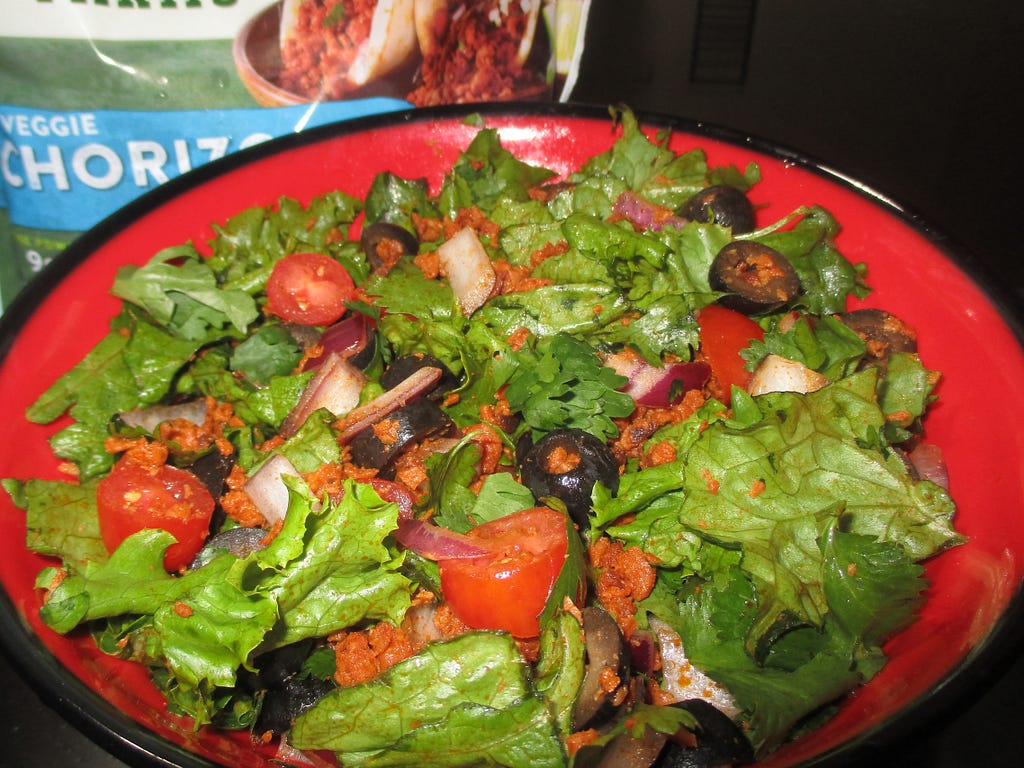 Tasty colorful healthy dressing-free salad with vegan chorizo.